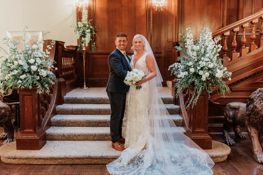 reused wedding flowers on staircase