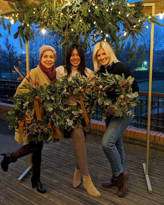 A Nothampton Xmas Wreath making group, outside the Snug, Grange Park