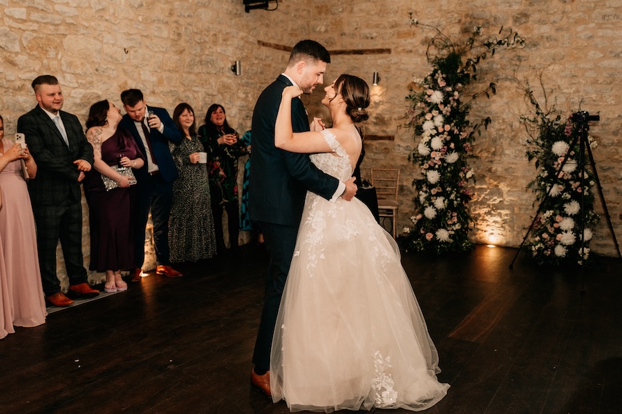 repurposed wedding flowers on dance floor